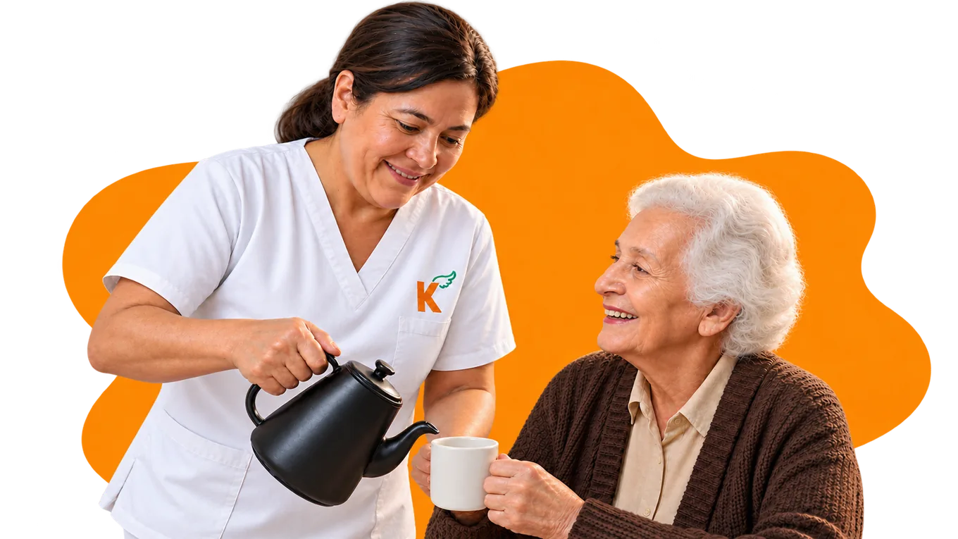 Cuidadora Kipers compartiendo una taza de té con una adulta mayor